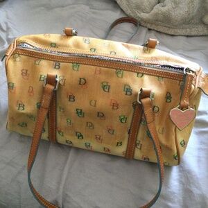 Vintage Dooney & Bourke off white/cream barrel bag, rainbow DB logo
